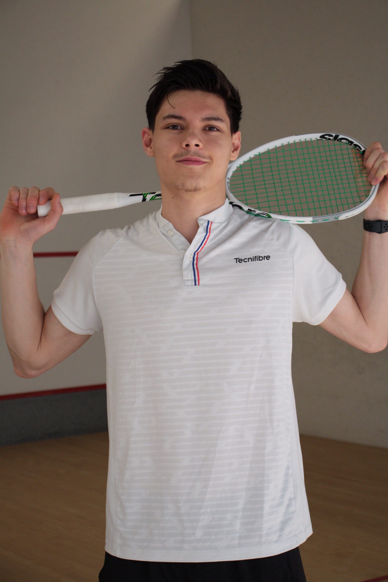 Hofman Squash Academy coach on court