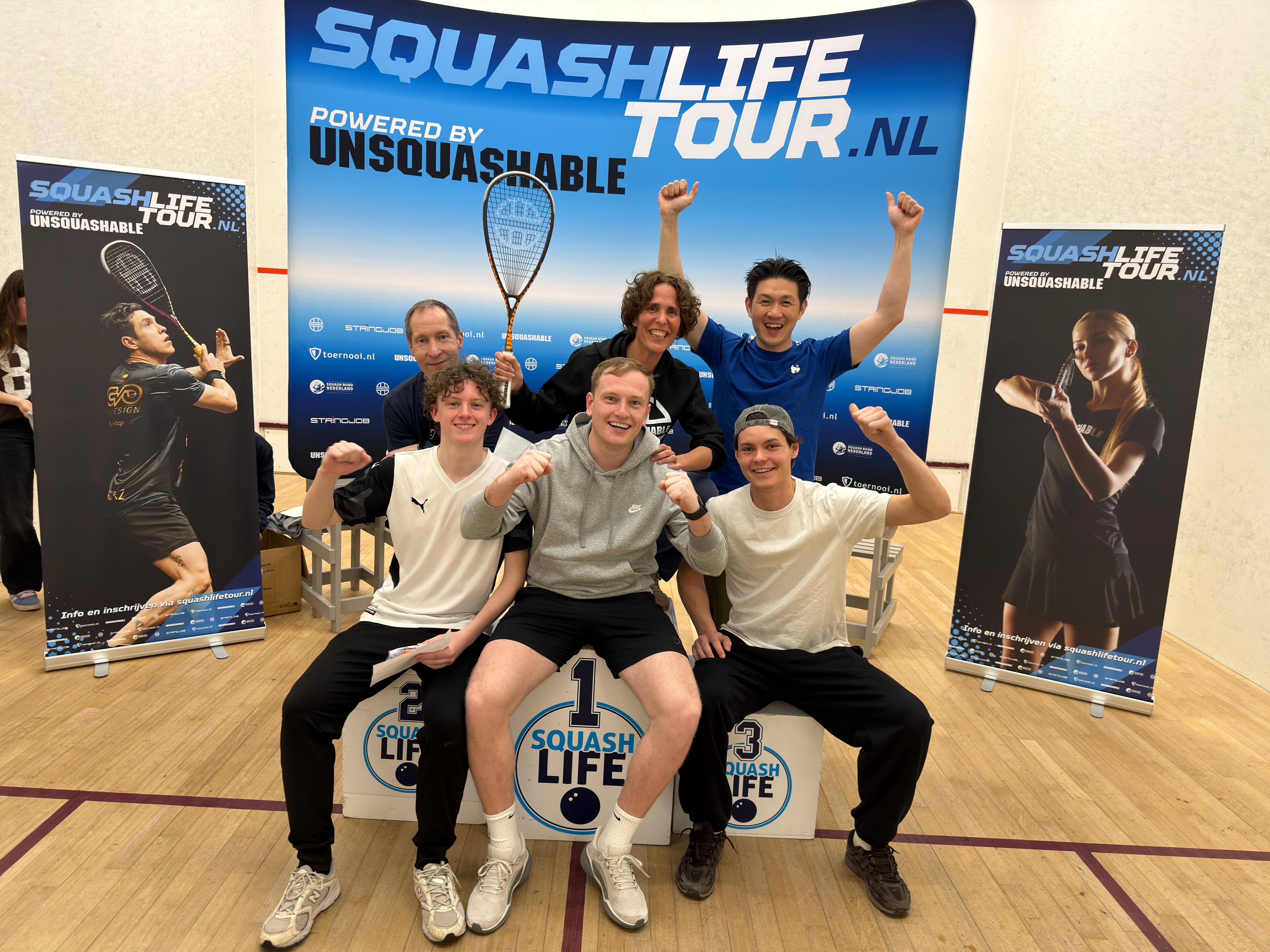 Players on the podium at a SquashLife Tour tournament
